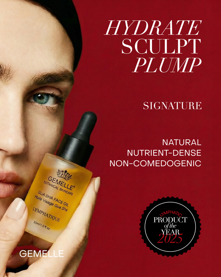 Person holding a bottle of GEMELLE skincare oil with text on a red background
